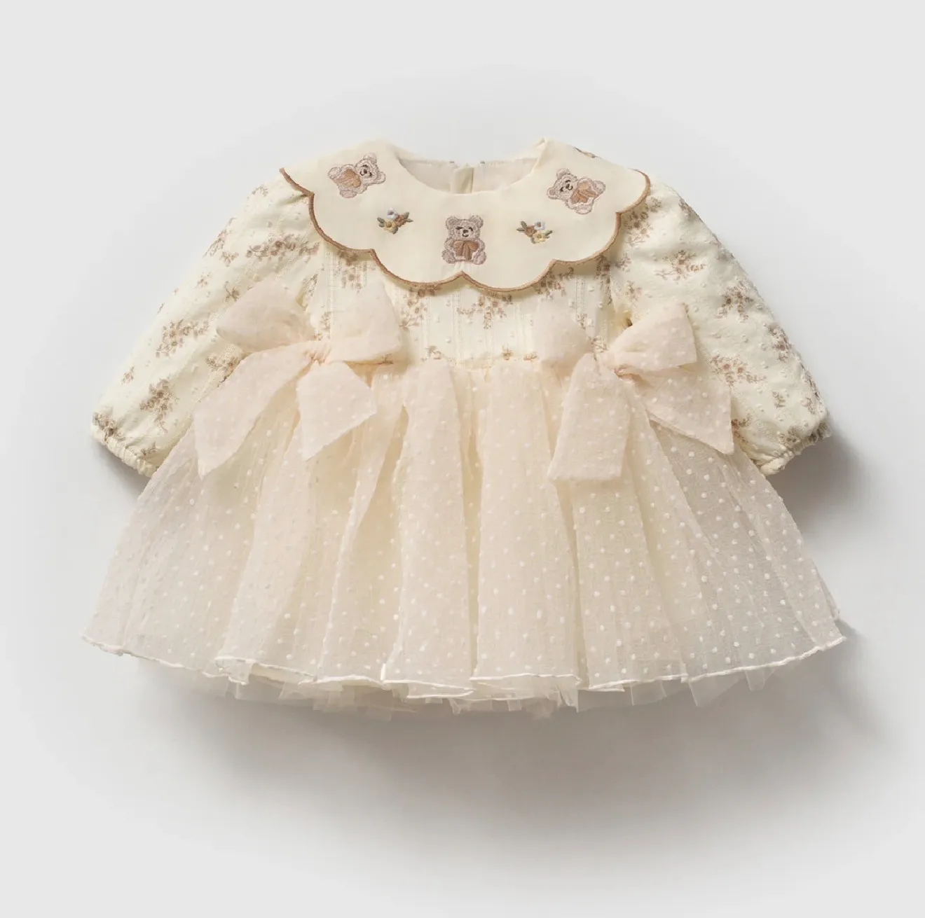 Ivory dress with purple embroidery