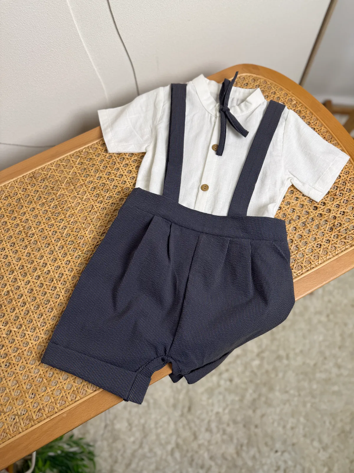 Striped overalls with a shirt